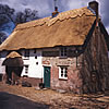 Rethatched cottage in combed wheat reed, Upton Dorset